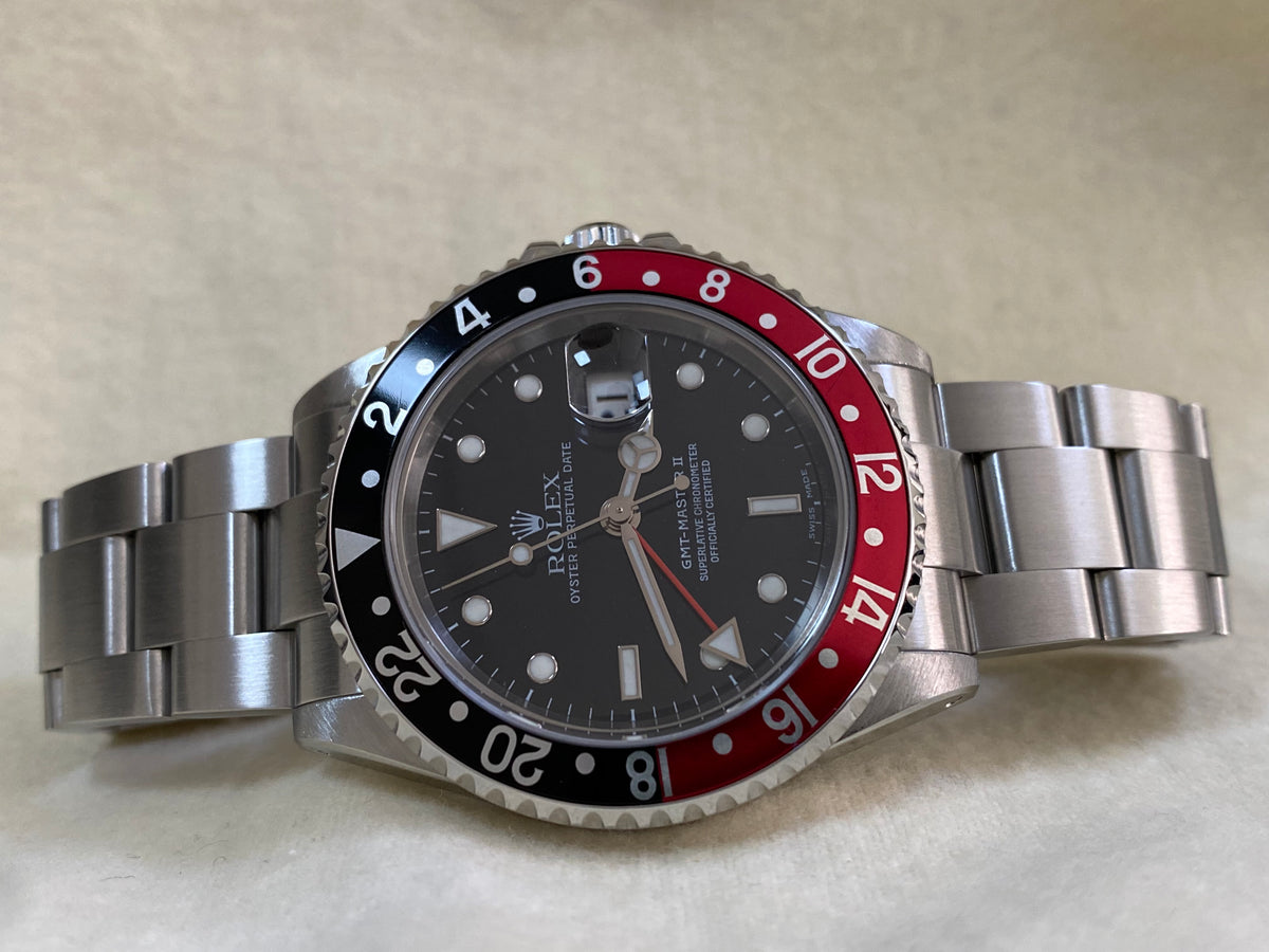 Rolex Steel GMT-Master II - K serial - "Coke" Pre Ceramic Bezel - Black Dial - Oyster Bracelet - 16710