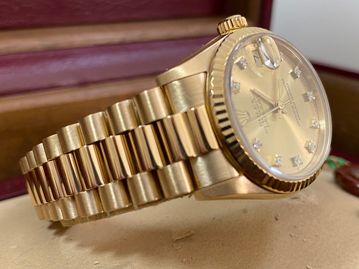 Rolex Yellow Gold Datejust 31 - L serial - Fluted Bezel - Factory Diamond Dial - President Bracelet - 68278