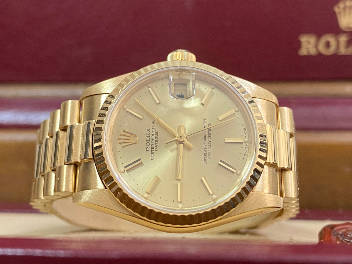 Rolex Yellow Gold Datejust 31 - Fluted Bezel - Champagne Index Dial - President Bracelet - 68278