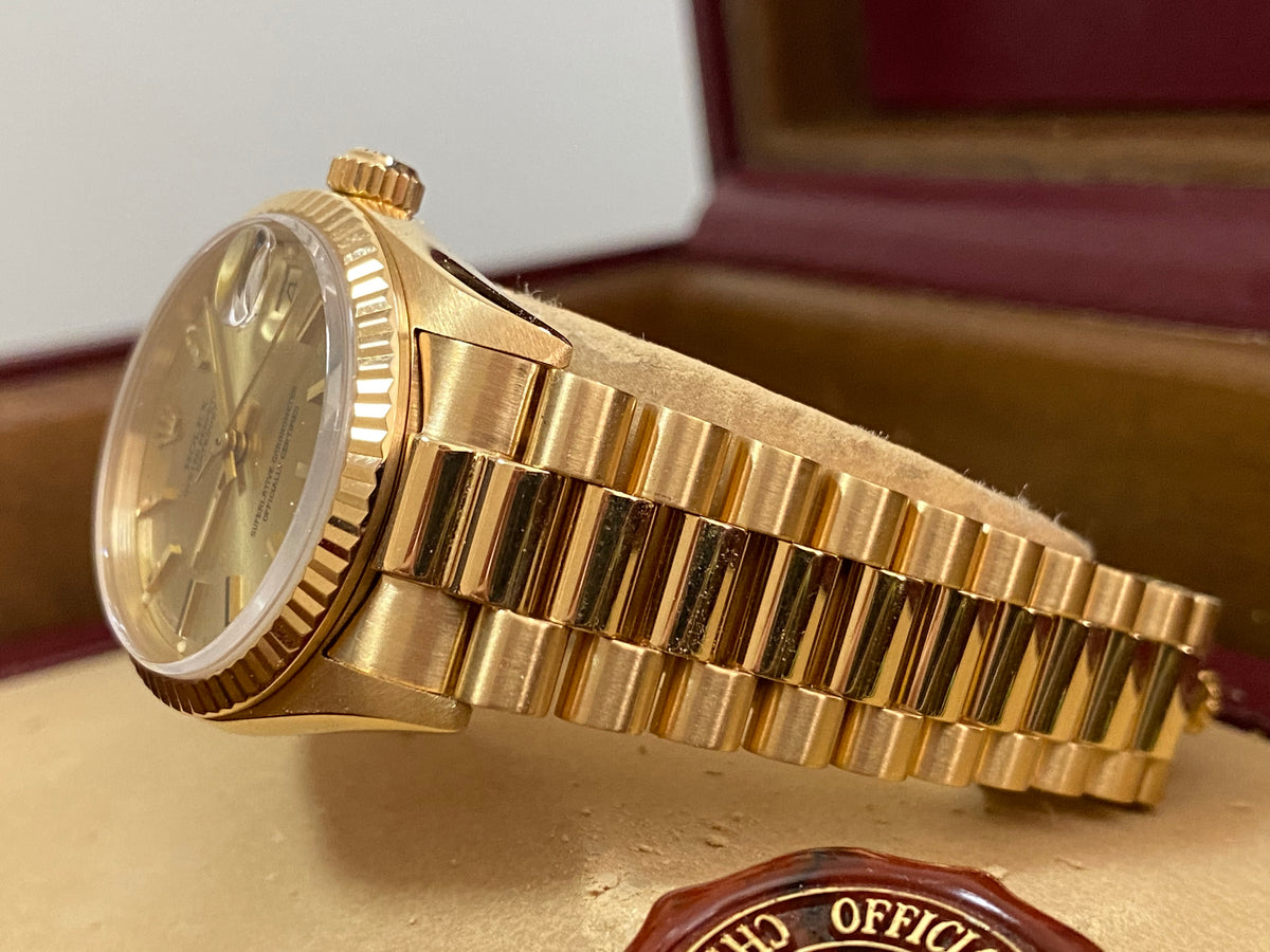 Rolex Yellow Gold Datejust 31 - Fluted Bezel - Champagne Index Dial - President Bracelet - 68278