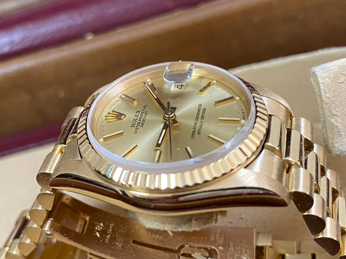 Rolex Yellow Gold Datejust 31 - Fluted Bezel - Champagne Index Dial - President Bracelet - 68278