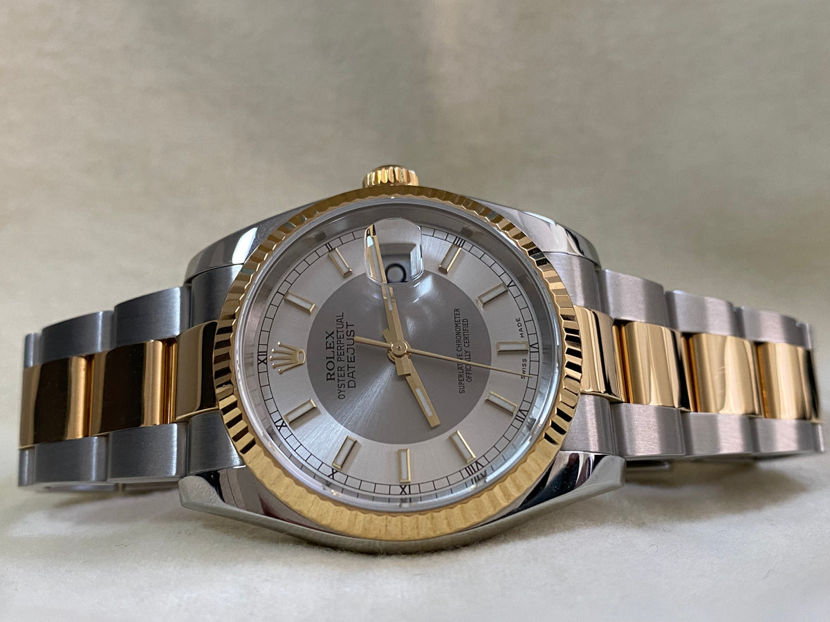 Rolex Steel and Yellow Gold Datejust 36 - D serial - Fluted Bezel - "Tuxedo" Dial - Oyster Bracelet - 116233