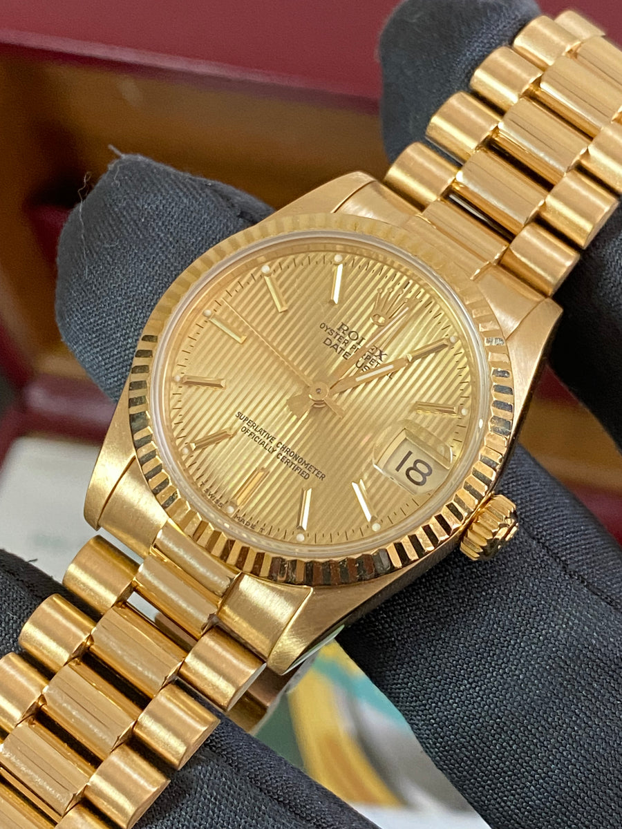 Rolex Yellow Gold Datejust 31 - L serial - Fluted Bezel - Tapestry Dial - President Bracelet - 68278