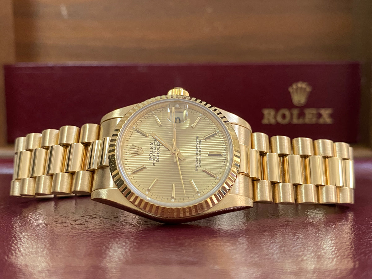 Rolex Yellow Gold Datejust 31 - L serial - Fluted Bezel - Tapestry Dial - President Bracelet - 68278