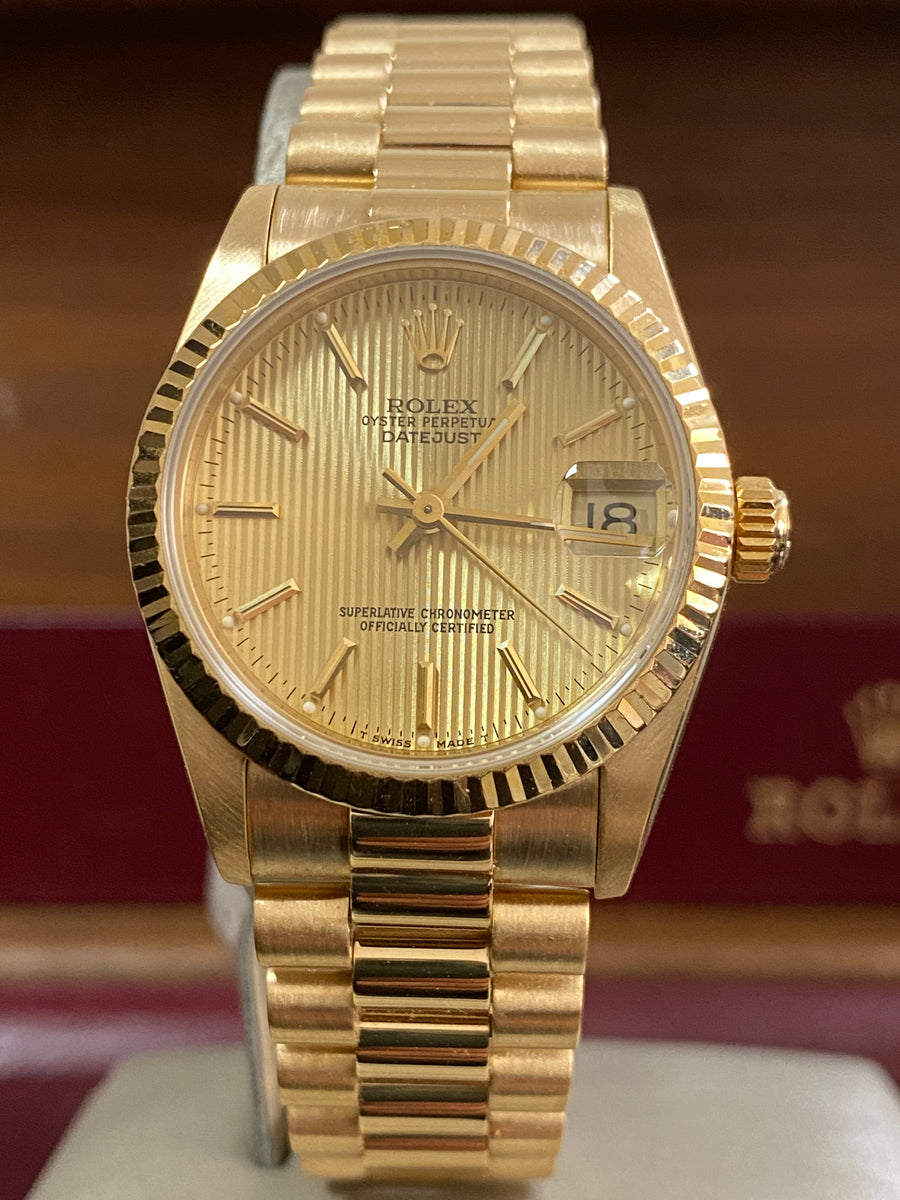 Rolex Yellow Gold Datejust 31 - L serial - Fluted Bezel - Tapestry Dial - President Bracelet - 68278