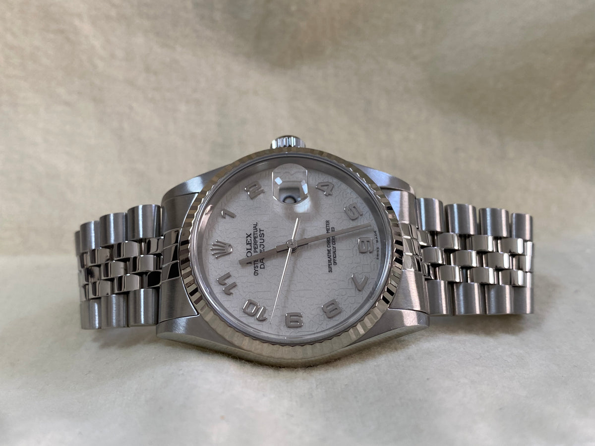 Rolex Steel Datejust 36 - P serial - Fluted Bezel - Silver with Embossed Rolex Arabic Dial - Jubilee Bracelet - 16234