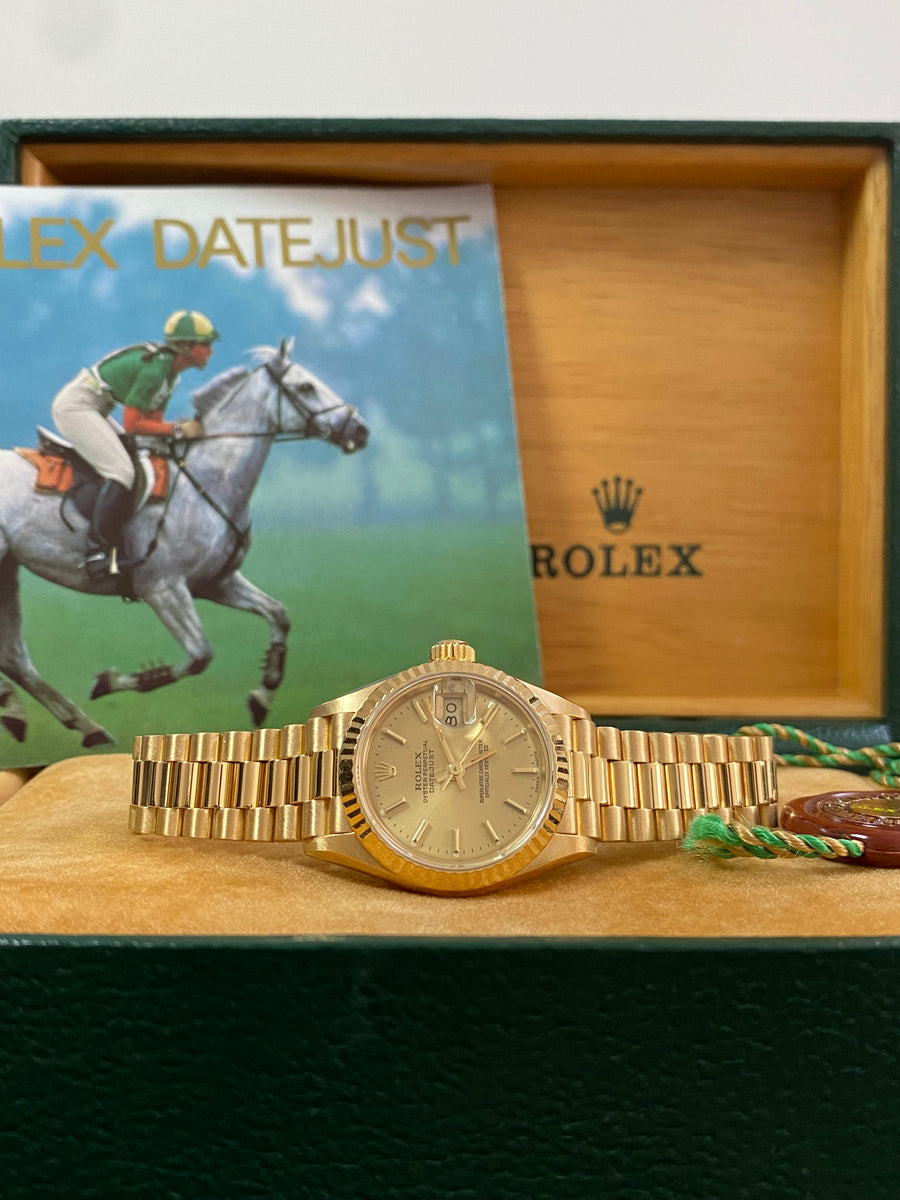 Rolex Yellow Gold Lady-Datejust - E serial - Fluted Bezel - Champagne Index Dial - President Bracelet - 69178