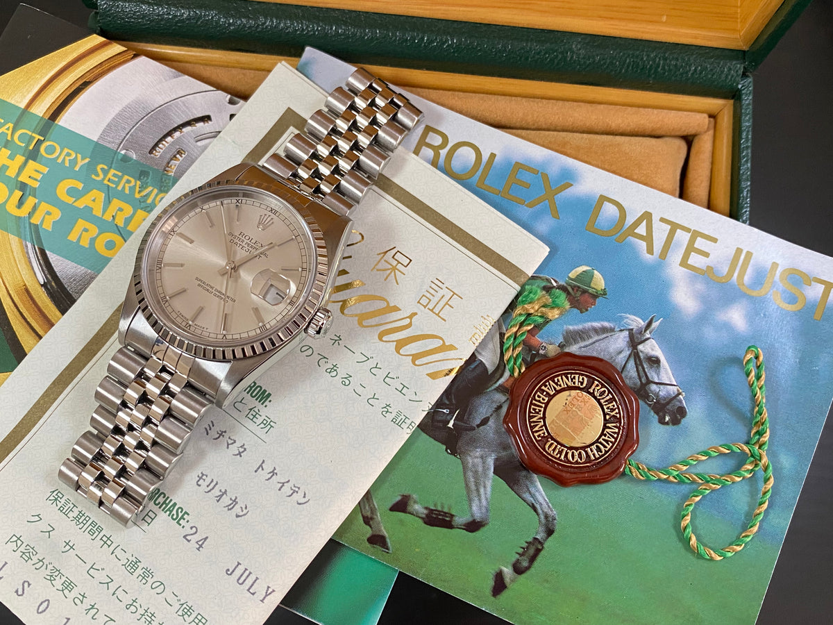 Rolex Steel Datejust 36 - U Serial - Engine Turned Bezel - Silver Index Dial - Jubilee Bracelet - 16220