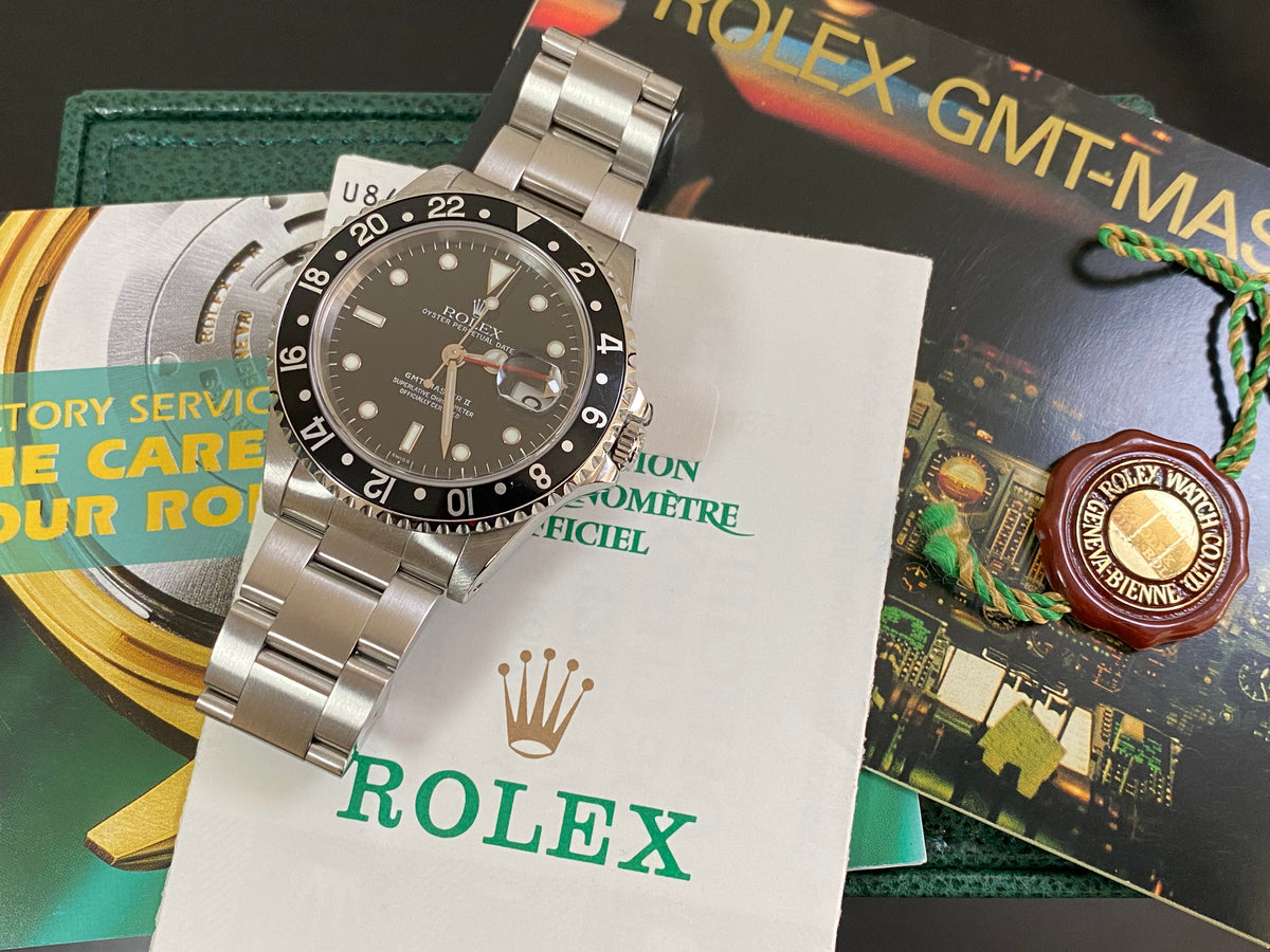 Rolex Steel GMT-Master II -  U Serial - Black Bezel - Black Dial with Red Arrow - Oyster Bracelet - 16710 *COMPLETE SET*