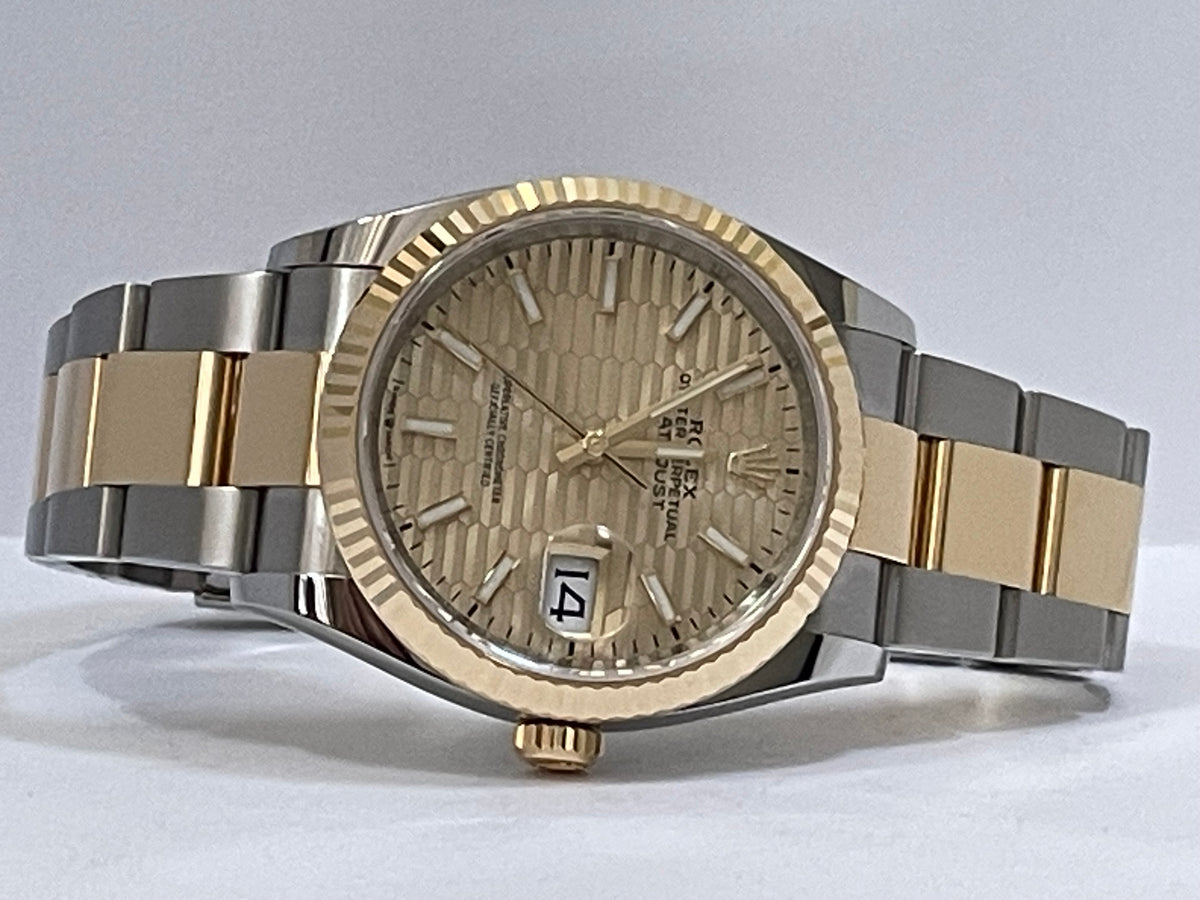 Rolex Steel and Yellow Gold Datejust 36 - 2023 - Fluted Bezel - Golden Motif Dial - Oyster Bracelet - 126233