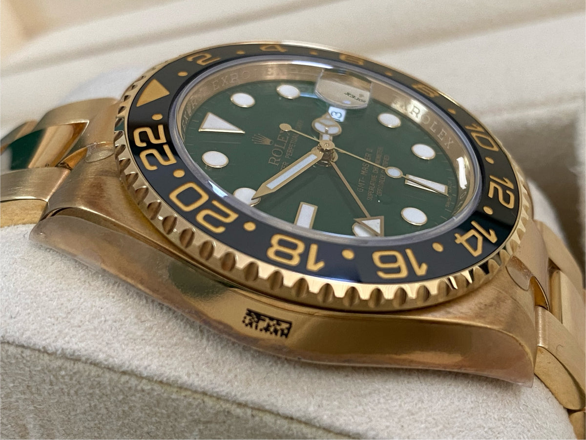 Rolex Yellow Gold GMT-Master II - G serial - Black Bezel - Green Dial - Oyster Bracelet - 116718LN *FULL STICKERS*