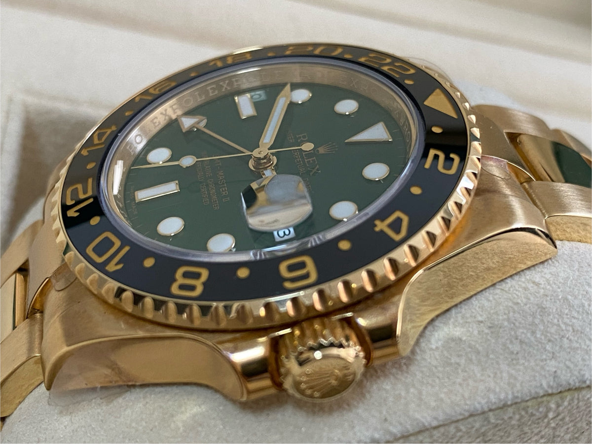 Rolex Yellow Gold GMT-Master II - G serial - Black Bezel - Green Dial - Oyster Bracelet - 116718LN *FULL STICKERS*