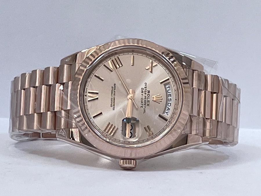 Rolex Everose Gold Day-Date 40 - 2023 - Fluted Bezel - Sundust Bevelled Roman Dial - President Bracelet - 228235