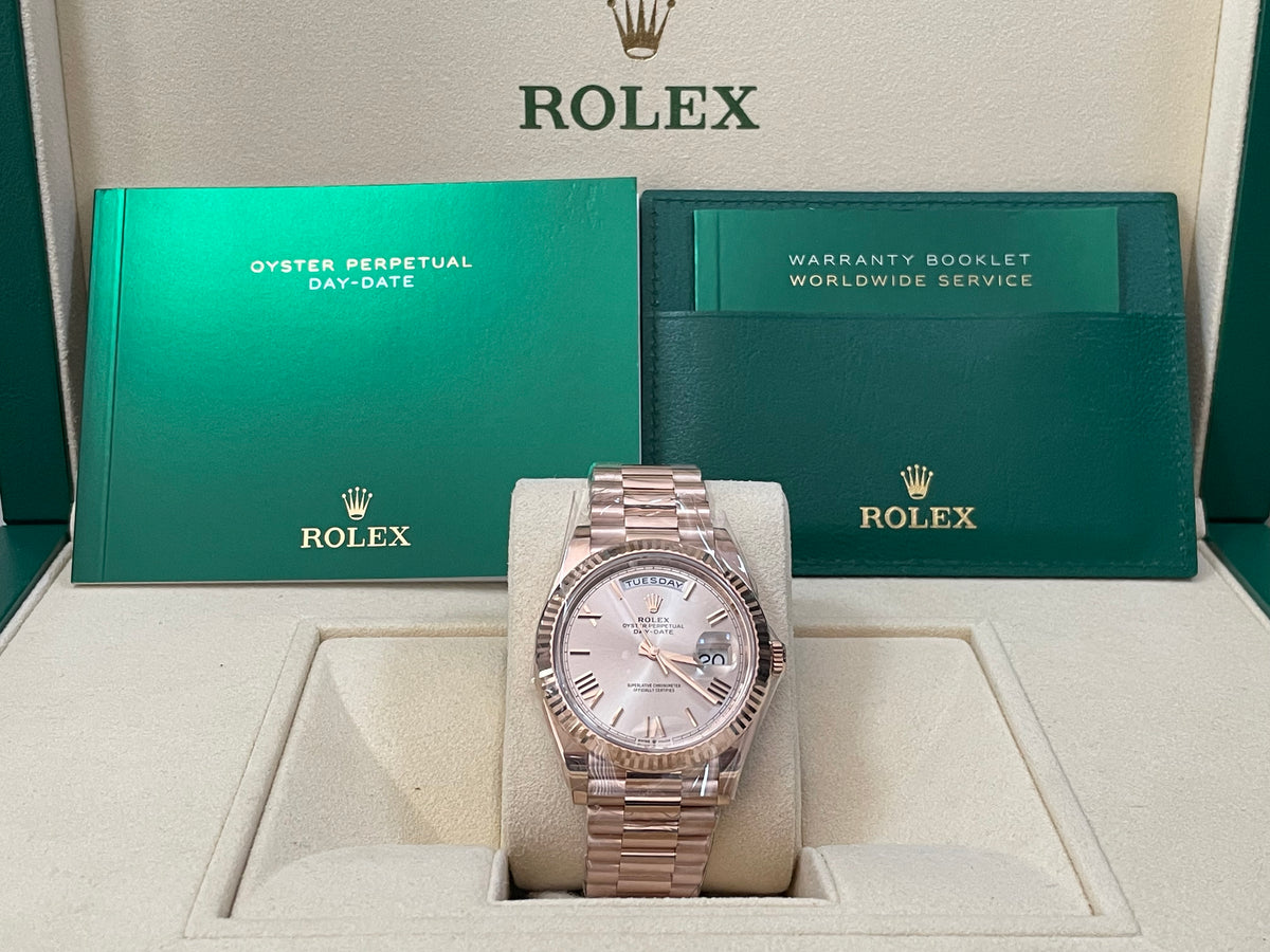 Rolex Everose Gold Day-Date 40 - 2023 - Fluted Bezel - Sundust Bevelled Roman Dial - President Bracelet - 228235