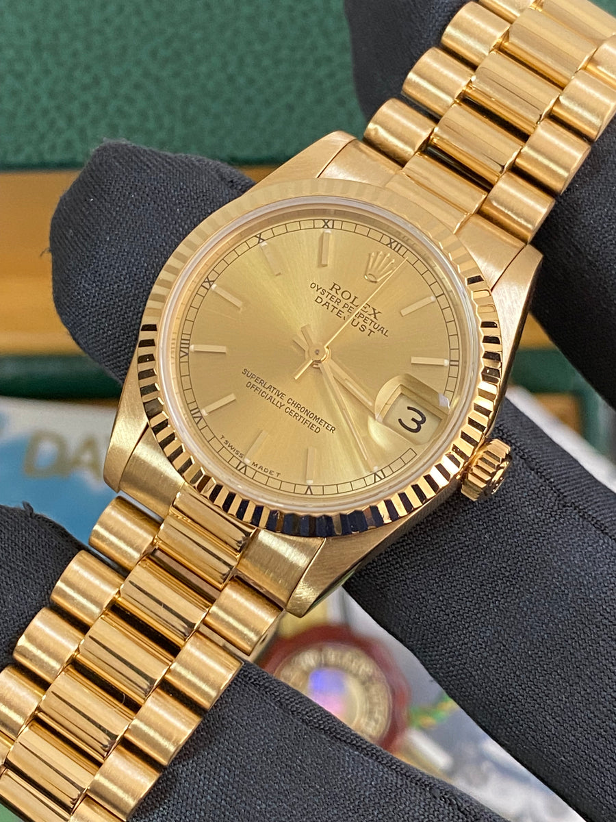 Rolex Yellow Gold Datejust 31 - L serial - Fluted Bezel - Champagne Index Dial - President Bracelet - 68278