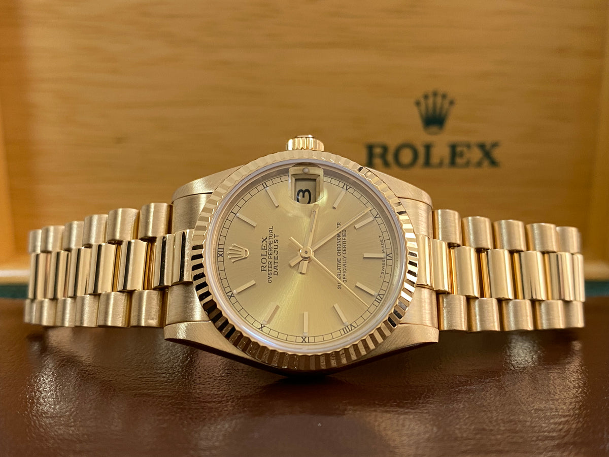 Rolex Yellow Gold Datejust 31 - L serial - Fluted Bezel - Champagne Index Dial - President Bracelet - 68278