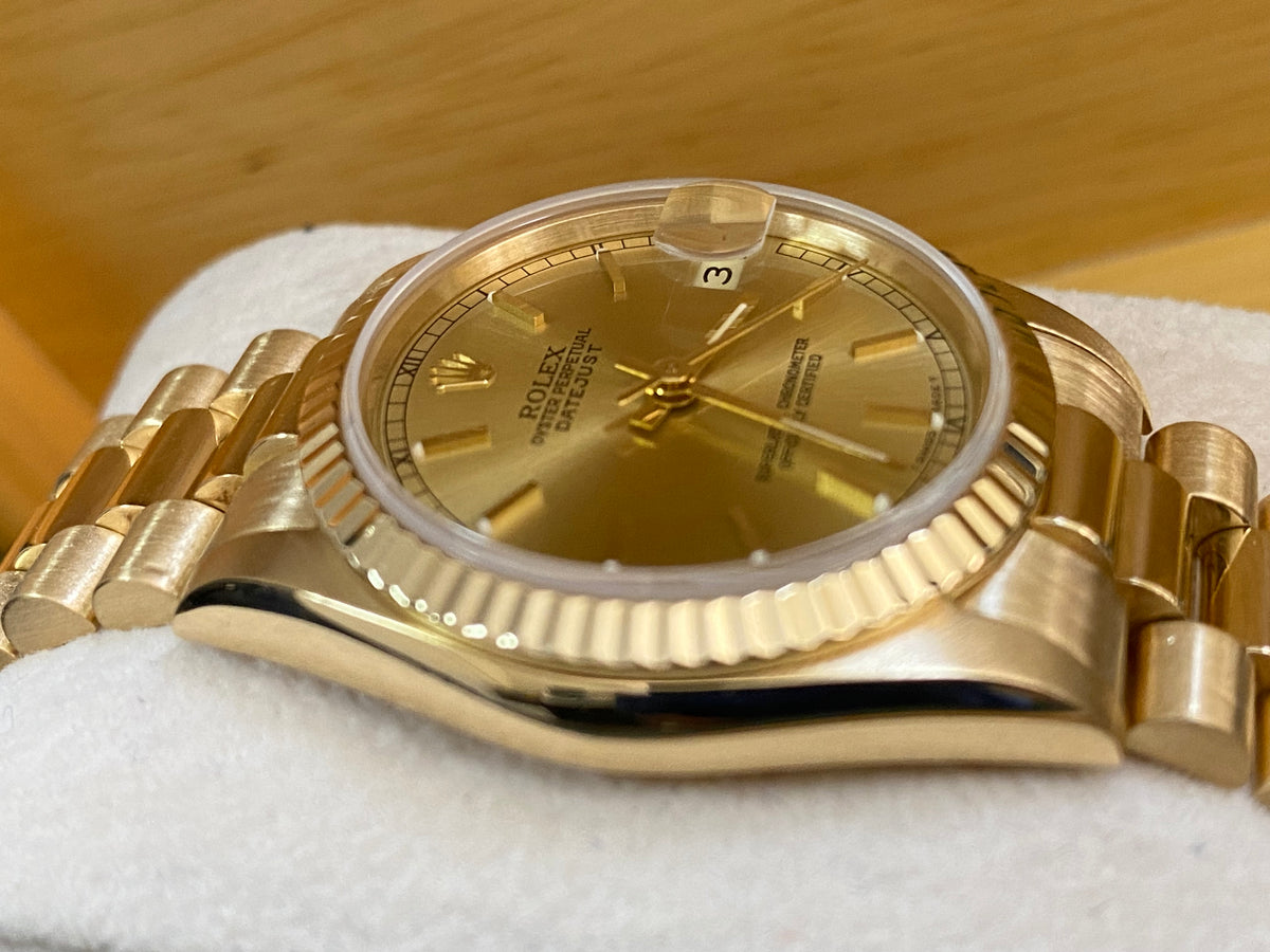 Rolex Yellow Gold Datejust 31 - L serial - Fluted Bezel - Champagne Index Dial - President Bracelet - 68278