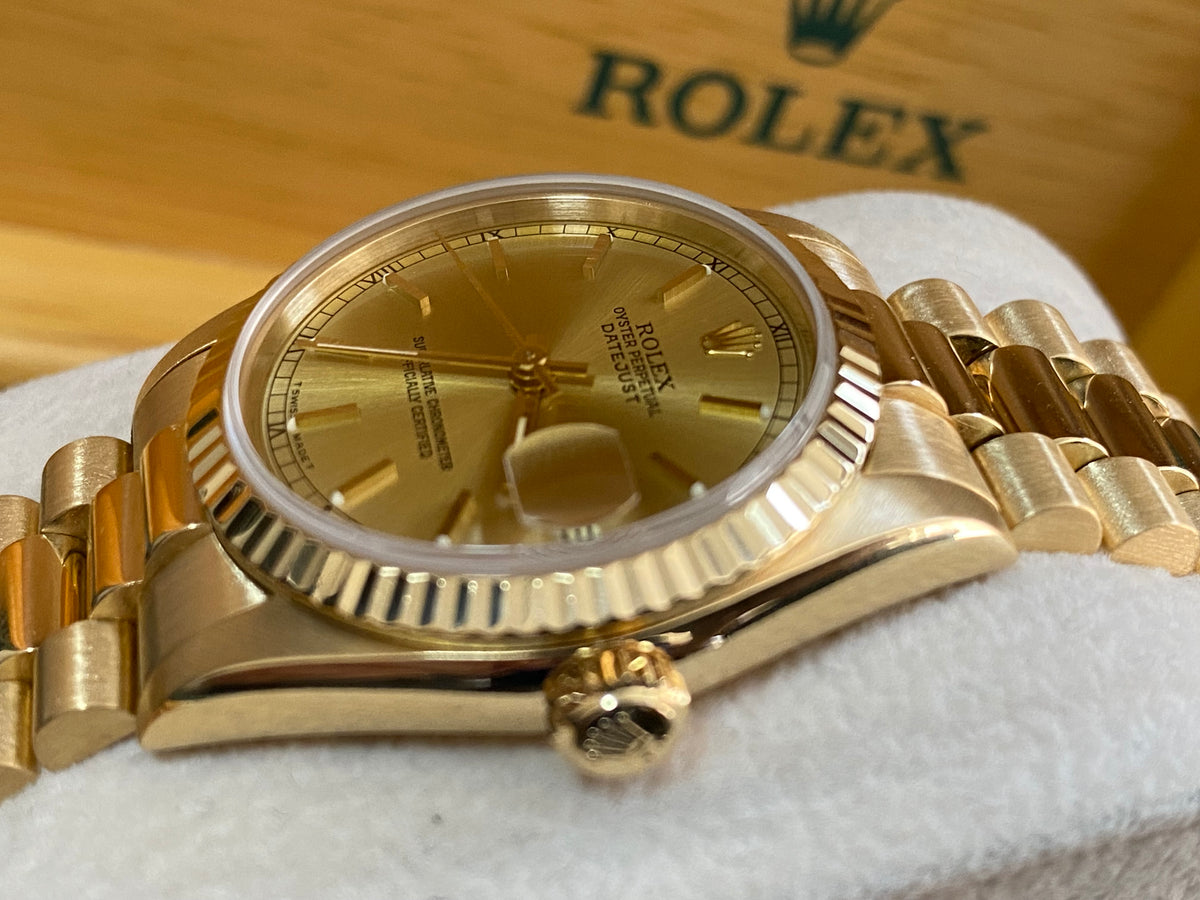 Rolex Yellow Gold Datejust 31 - L serial - Fluted Bezel - Champagne Index Dial - President Bracelet - 68278