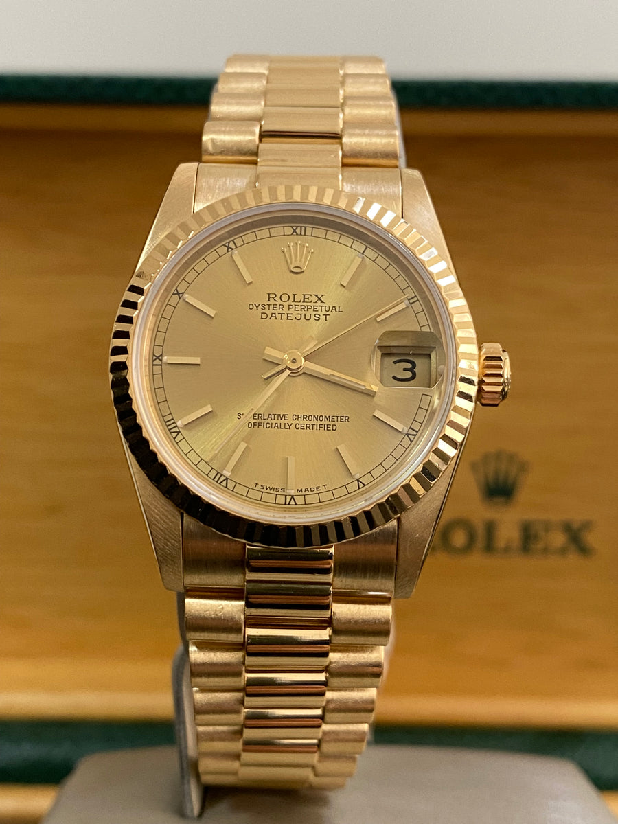 Rolex Yellow Gold Datejust 31 - L serial - Fluted Bezel - Champagne Index Dial - President Bracelet - 68278