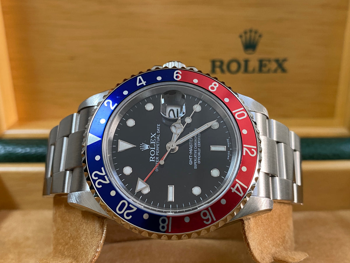 Rolex Steel GMT-Master II -  D serial - "Pepsi" No Holes Case - Black Dial - Oyster Bracelet - 16710 *COMPLETE SET*