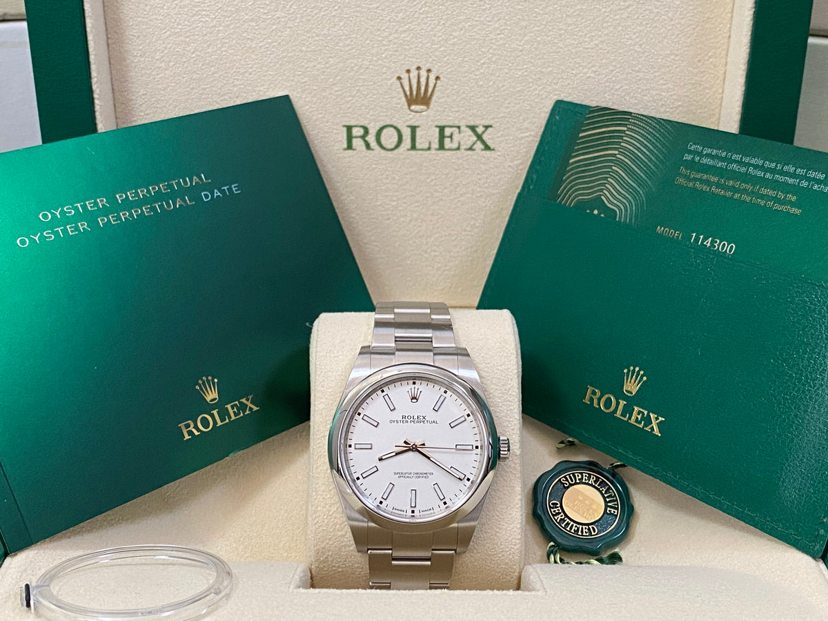 Rolex Steel Oyster Perpetual 39 - 2020 - Domed Bezel - White Index Dial - 114300 NEW STYLE WARRANTY CARD