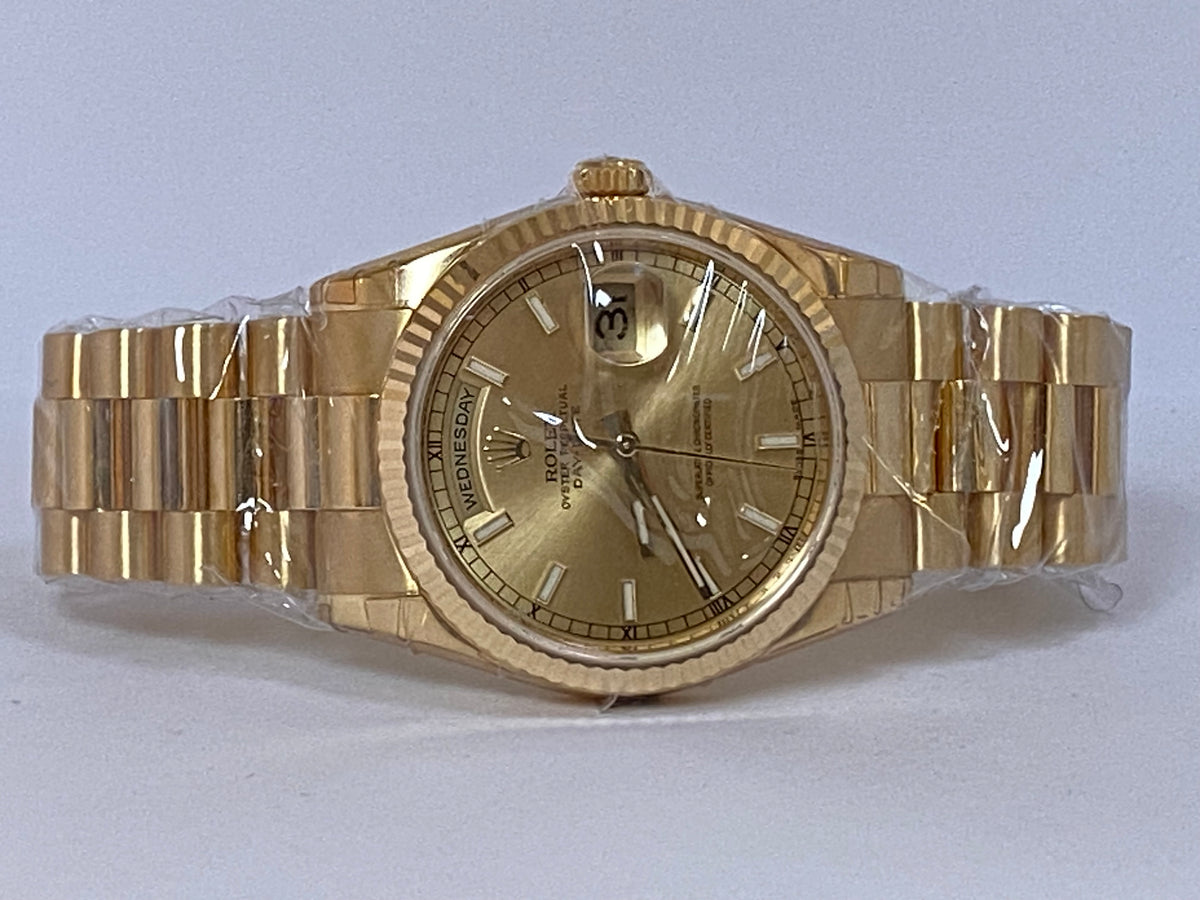 Rolex Yellow Gold Day-Date 36 - Fluted Bezel - Champagne Index Dial - President Bracelet - 118238