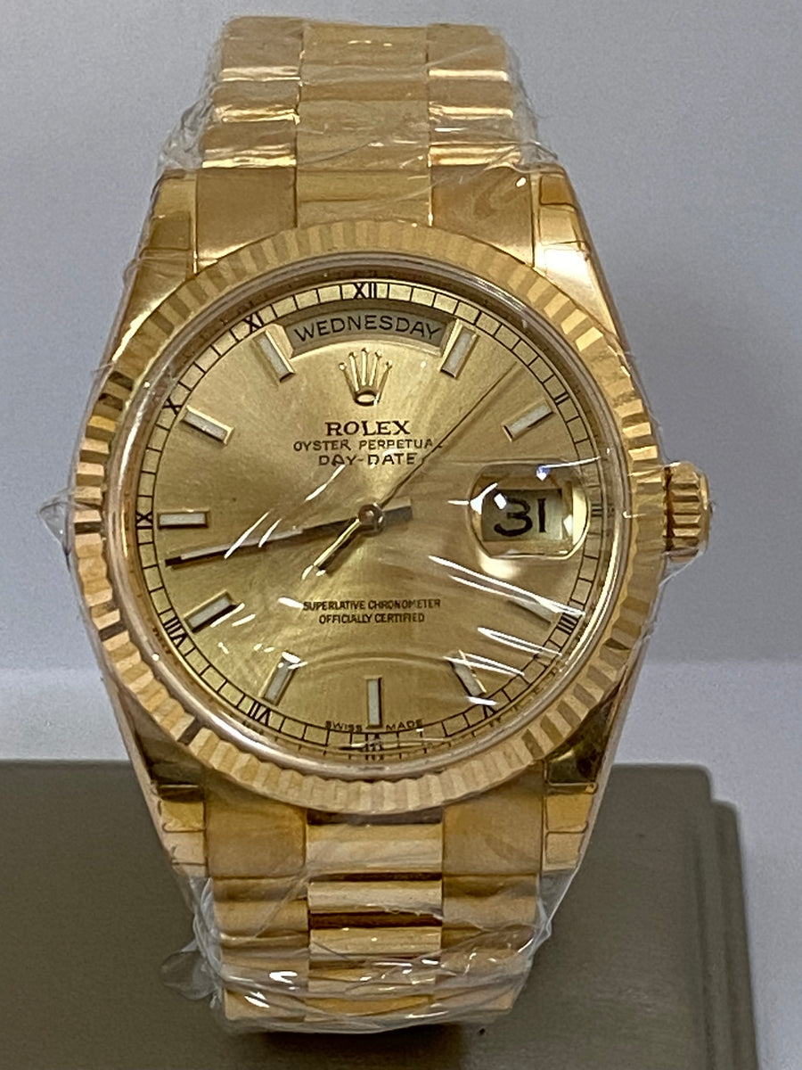 Rolex Yellow Gold Day-Date 36 - Fluted Bezel - Champagne Index Dial - President Bracelet - 118238