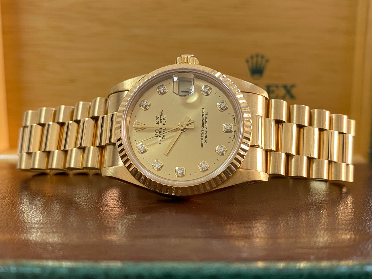 Rolex Yellow Gold Datejust 31 - W serial - Fluted Bezel - Factory Diamond Dial - President Bracelet - 68278