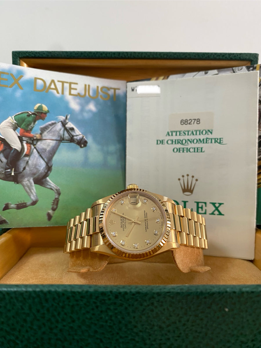 Rolex Yellow Gold Datejust 31 - W serial - Fluted Bezel - Factory Diamond Dial - President Bracelet - 68278