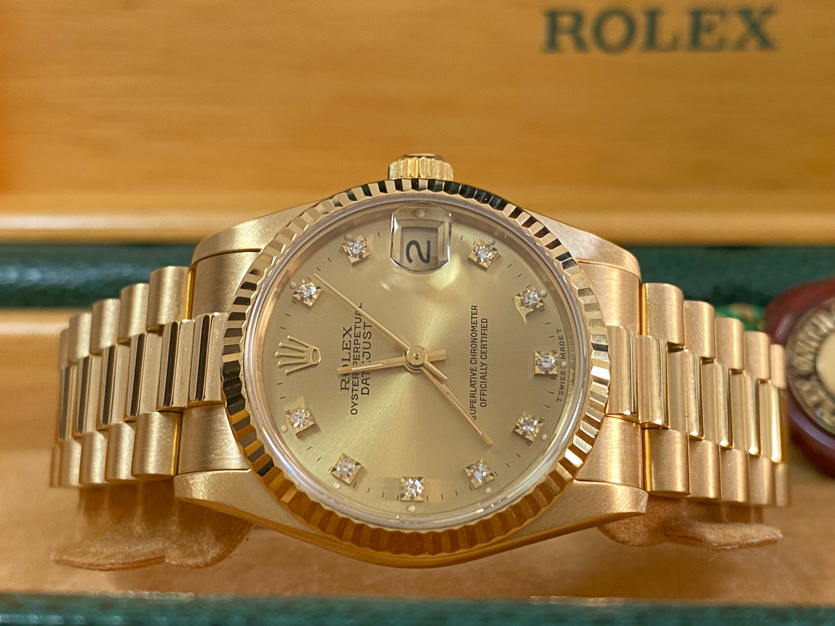 Rolex Yellow Gold Datejust 31 - N serial - Fluted Bezel - Factory Diamond Dial - President Bracelet - 68278