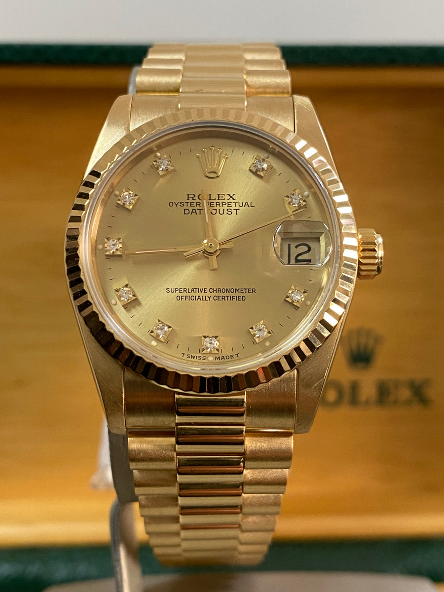 Rolex Yellow Gold Datejust 31 - N serial - Fluted Bezel - Factory Diamond Dial - President Bracelet - 68278