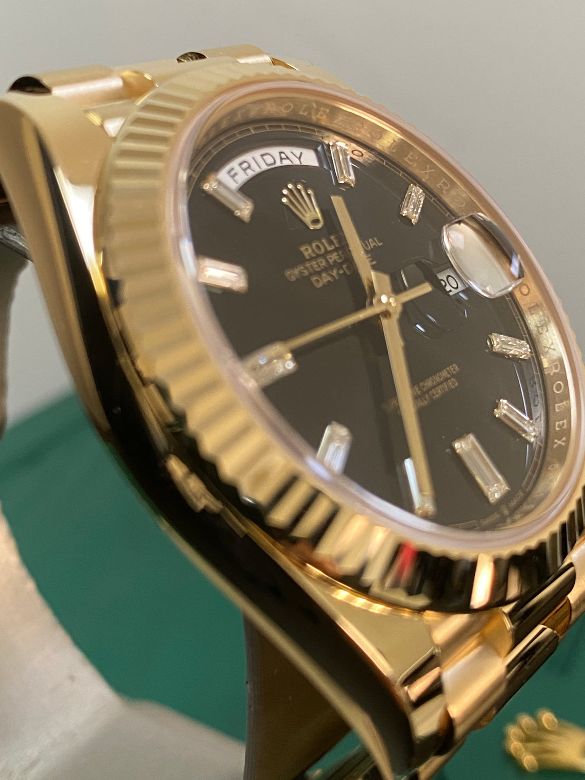 Rolex Yellow Gold Day-Date 40 - 2023 - Fluted Bezel - Black Baguette Diamond Dial - President Bracelet - 228238