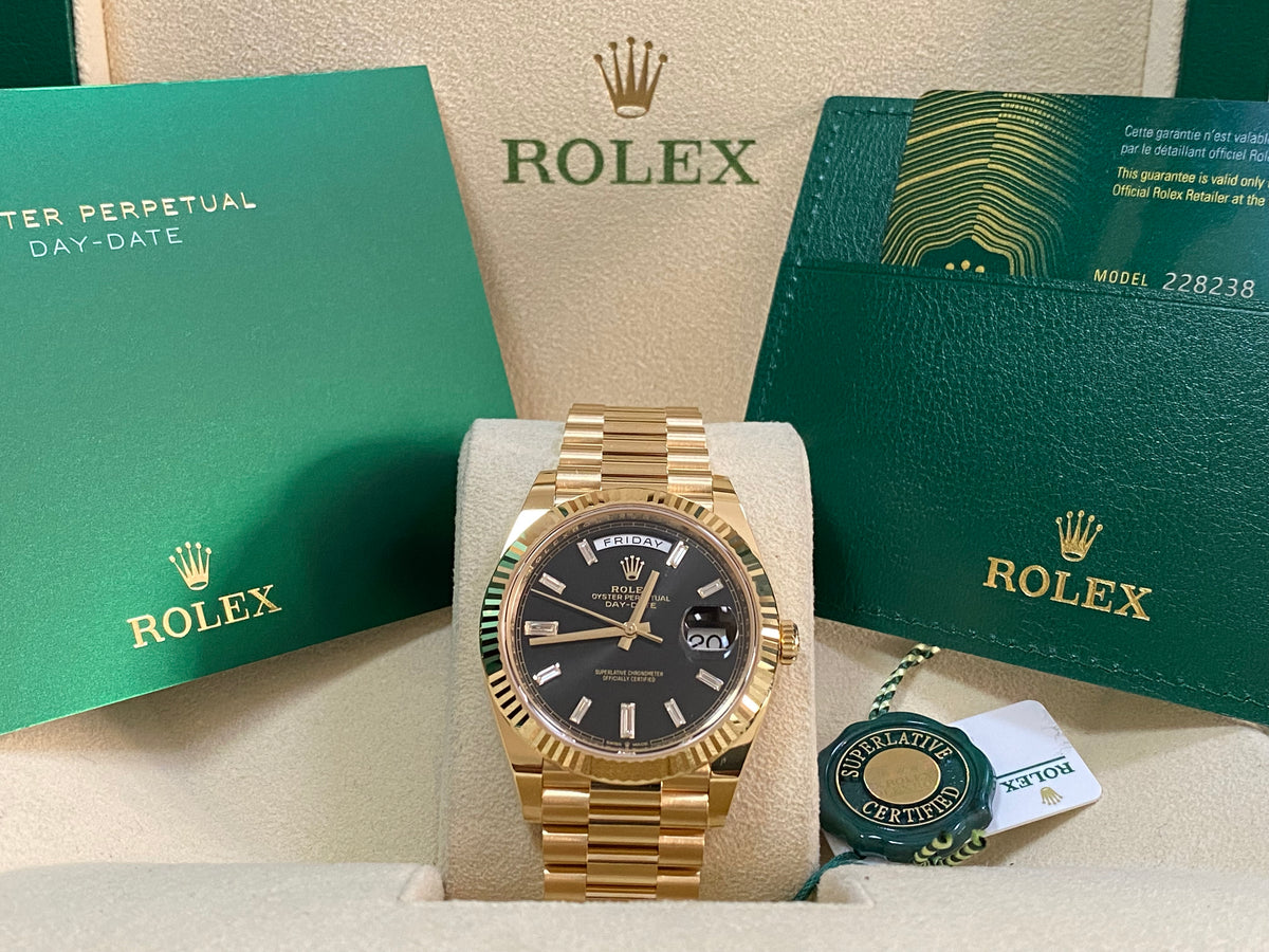 Rolex Yellow Gold Day-Date 40 - 2023 - Fluted Bezel - Black Baguette Diamond Dial - President Bracelet - 228238