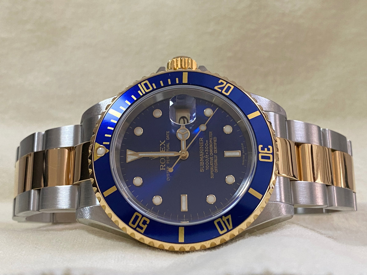 Rolex Yellow Gold and Steel Submariner Date - F serial - Pre Ceramic Blue Bezel - Blue Dial - 16613 *FULL SET*