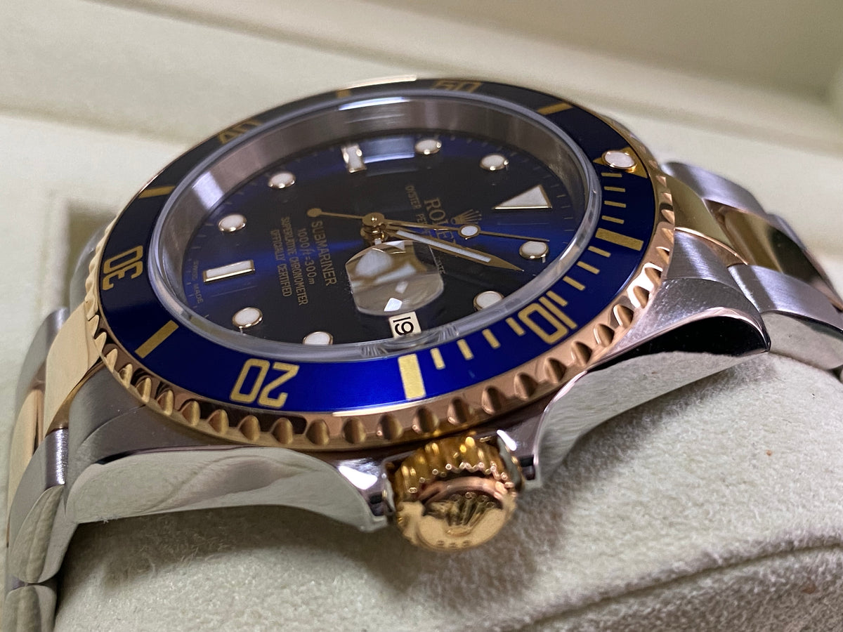 Rolex Yellow Gold and Steel Submariner Date - F serial - Pre Ceramic Blue Bezel - Blue Dial - 16613 *FULL SET*