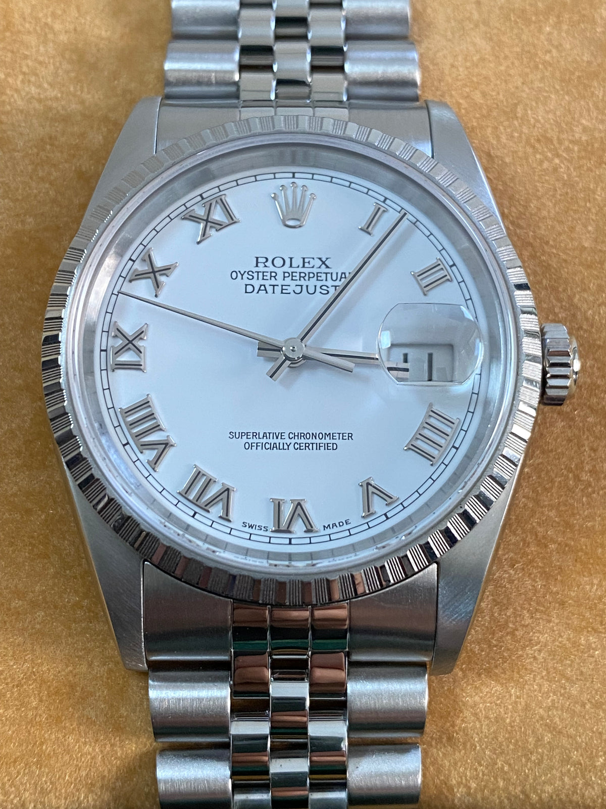 Rolex Steel Datejust 36 - F serial - Engine Turned Bezel - White Roman Dial - Jubilee Bracelet - 16220