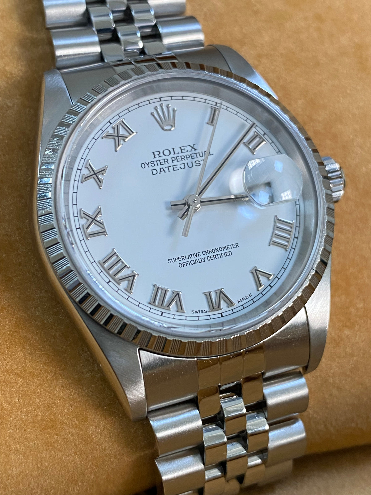 Rolex Steel Datejust 36 - F serial - Engine Turned Bezel - White Roman Dial - Jubilee Bracelet - 16220