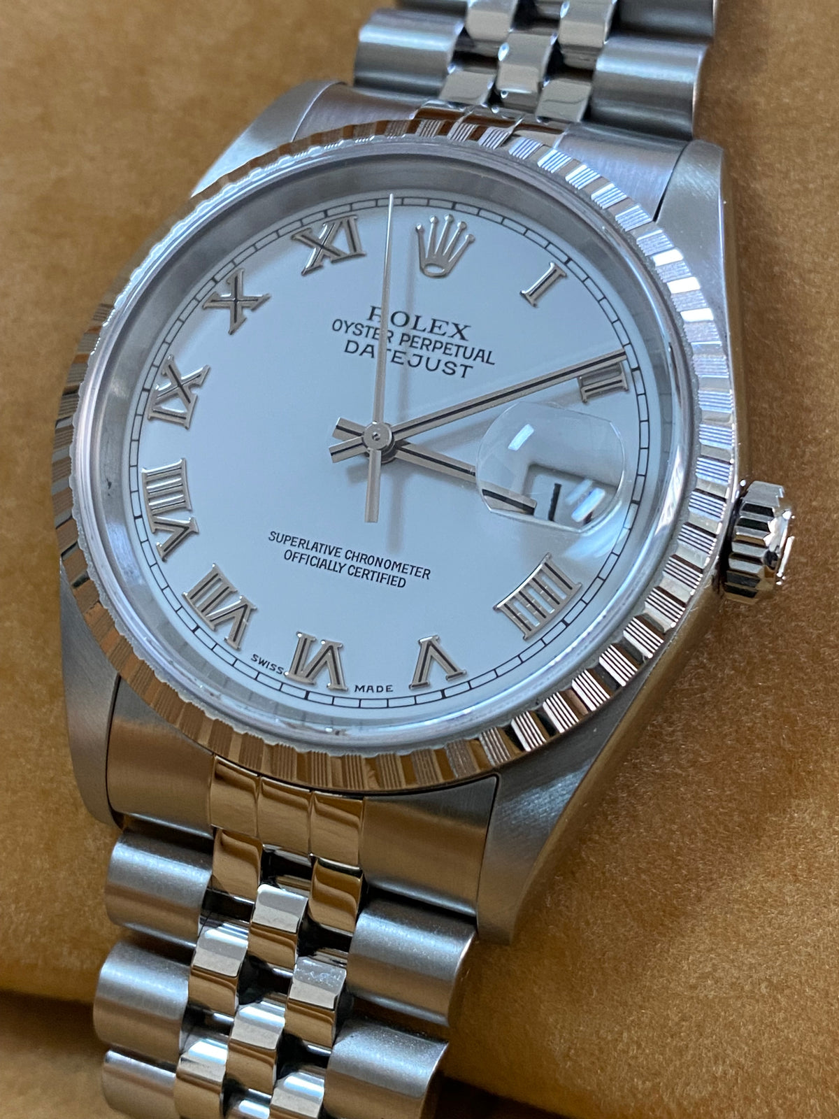 Rolex Steel Datejust 36 - F serial - Engine Turned Bezel - White Roman Dial - Jubilee Bracelet - 16220