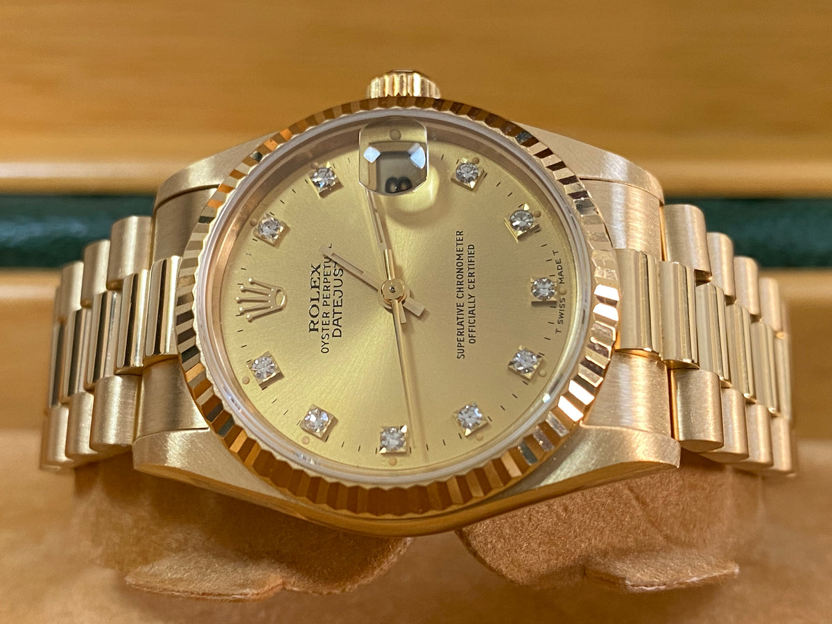 Rolex Yellow Gold Datejust 31 - N serial - Fluted Bezel - Factory Diamond Dial - President Bracelet - 68278