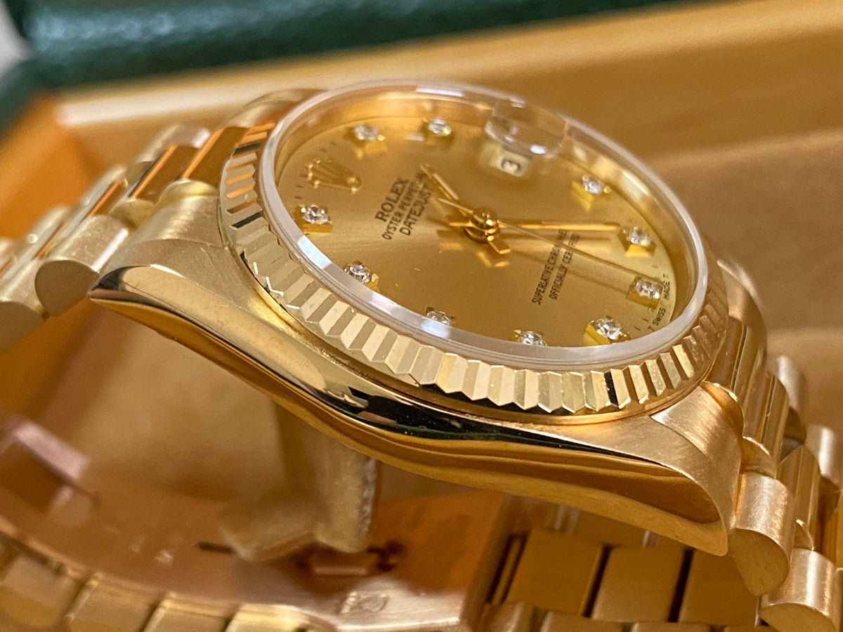 Rolex Yellow Gold Datejust 31 - N serial - Fluted Bezel - Factory Diamond Dial - President Bracelet - 68278