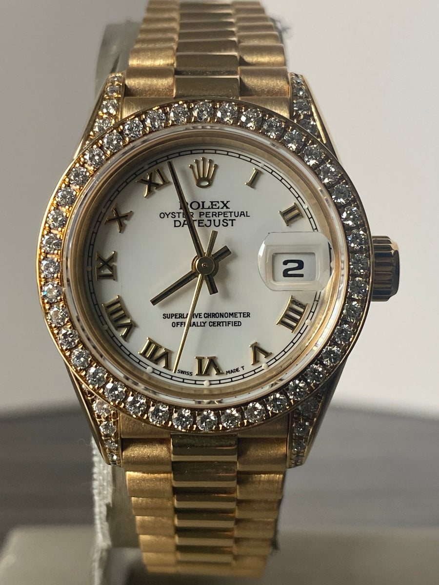 Rolex Yellow Gold Lady-Datejust - 1990 - Diamond Bezel - White Roman Dial - President Bracelet - 69158 "Crown Collection"