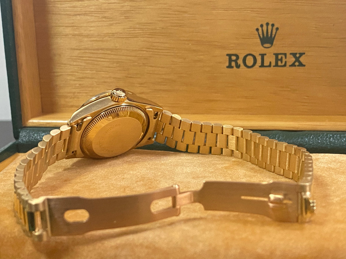 Rolex Yellow Gold Lady-Datejust - 1990 - Diamond Bezel - White Roman Dial - President Bracelet - 69158 "Crown Collection"