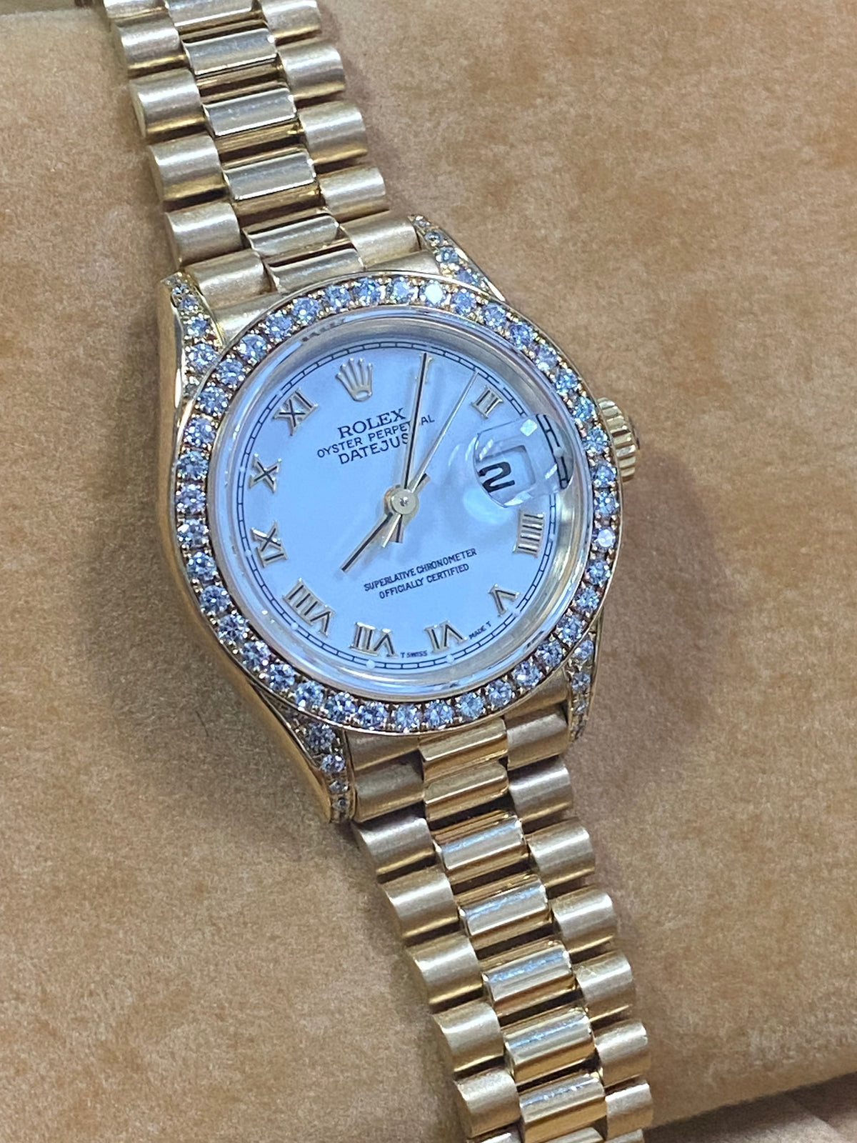 Rolex Yellow Gold Lady-Datejust - 1990 - Diamond Bezel - White Roman Dial - President Bracelet - 69158 "Crown Collection"