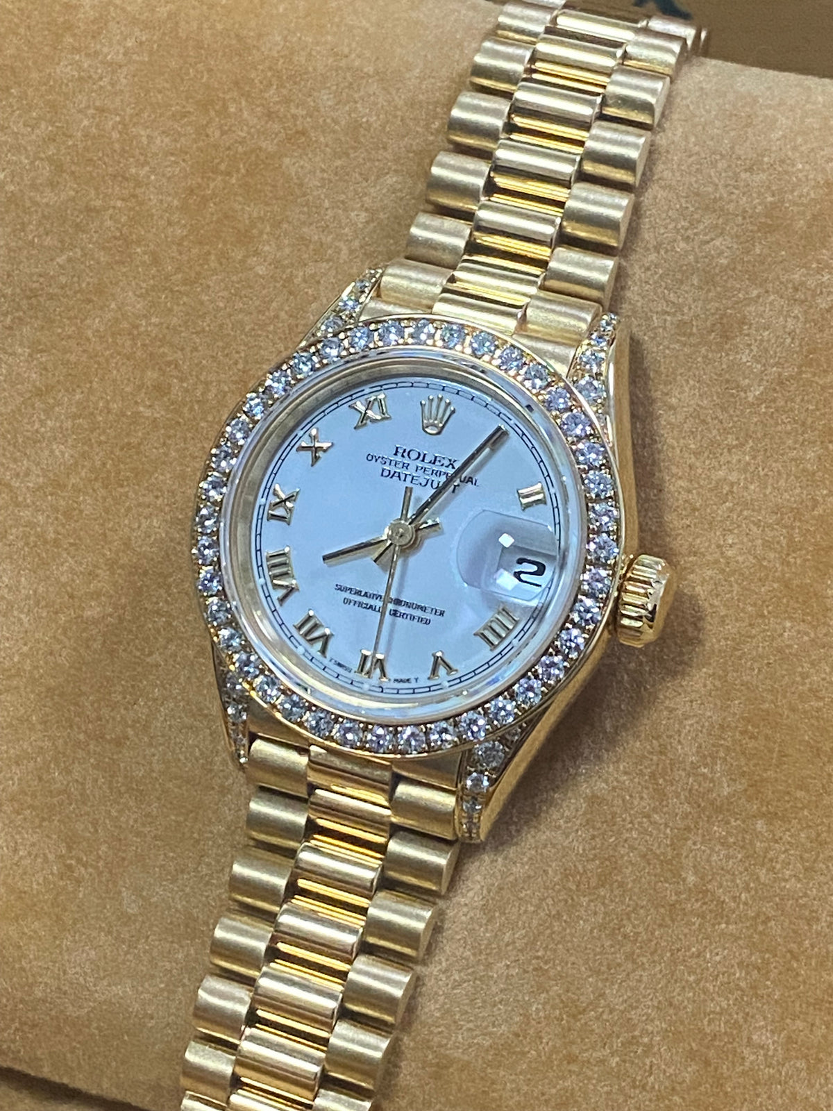 Rolex Yellow Gold Lady-Datejust - 1990 - Diamond Bezel - White Roman Dial - President Bracelet - 69158 "Crown Collection"