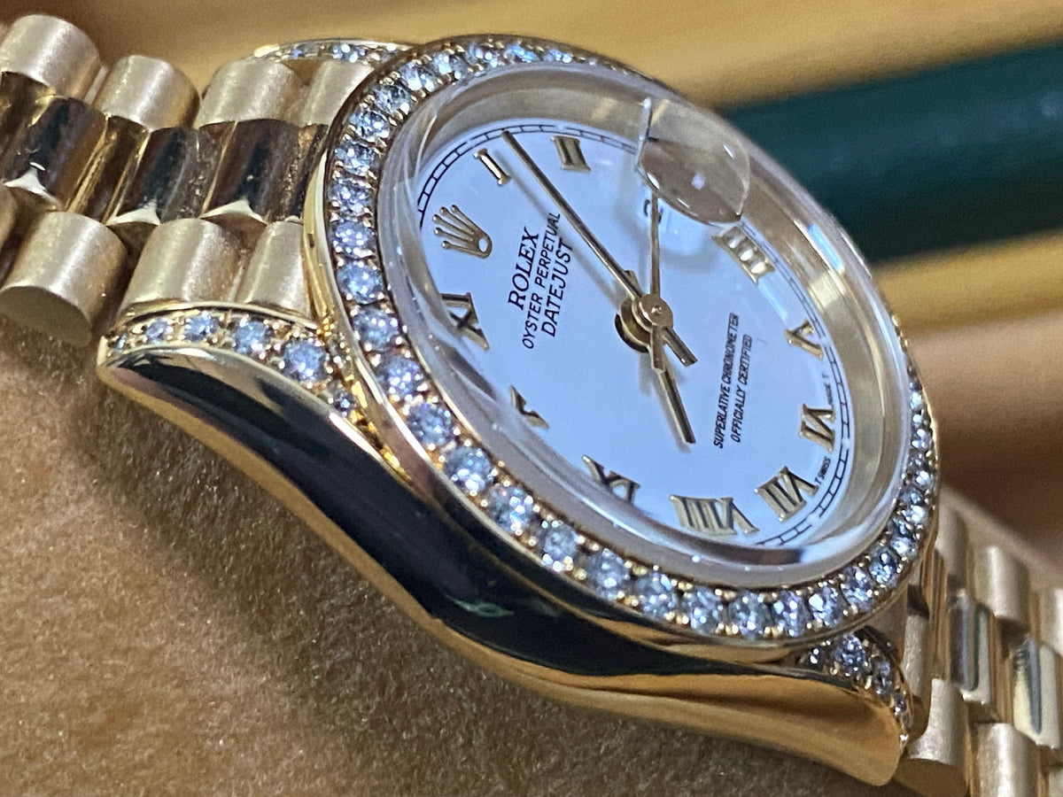 Rolex Yellow Gold Lady-Datejust - 1990 - Diamond Bezel - White Roman Dial - President Bracelet - 69158 "Crown Collection"