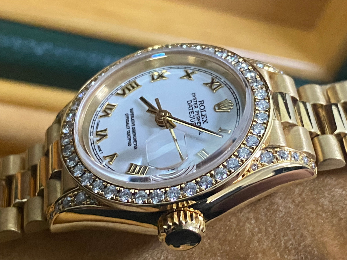 Rolex Yellow Gold Lady-Datejust - 1990 - Diamond Bezel - White Roman Dial - President Bracelet - 69158 "Crown Collection"