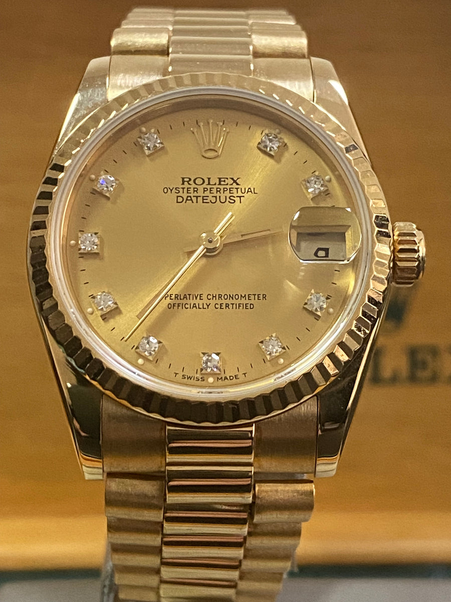 Rolex Yellow Gold Datejust 31 - N Serial - Fluted Bezel - Factory Diamond Dial - President Bracelet - 68278