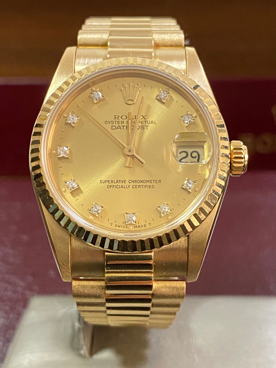 Rolex Yellow Gold Datejust 31 - L Serial - Fluted Bezel - Factory Diamond Dial - President Bracelet - 68278