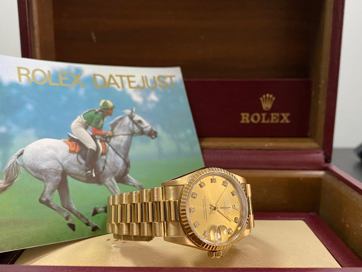 Rolex Yellow Gold Datejust 31 - L Serial - Fluted Bezel - Factory Diamond Dial - President Bracelet - 68278