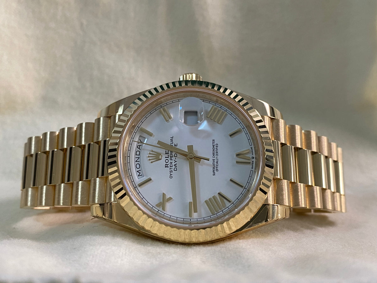 Rolex Yellow Gold Day-Date 40 - 2024 - Fluted Bezel - White Roman Dial - President Bracelet - 228238 *PARTIAL STICKERS*